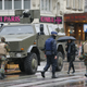 Belgian soldiers and a police officer patrol in central Brussels, November 21, 2015, after security was tightened in Belgium following the fatal attacks in Paris. Belgium raised the alert status for its capital Brussels to the highest level on Saturday, shutting the metro and warning the public to avoid crowds because of a "serious and imminent" threat of an attack.